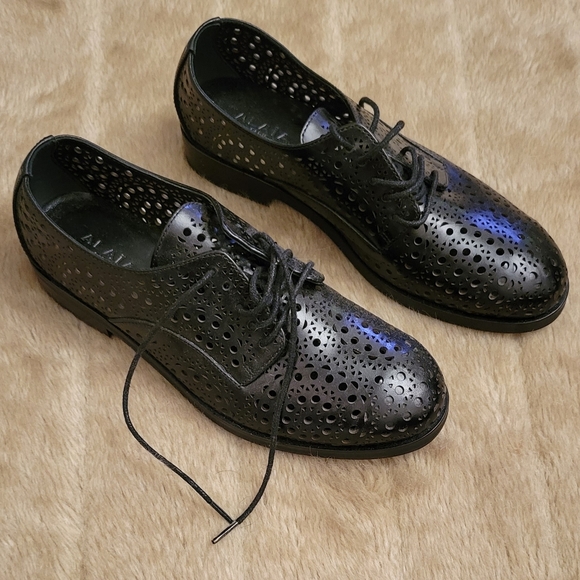 NEW tags Alaia Perforated Derbies laser cut leather Oxford shoes Bergdorf tags